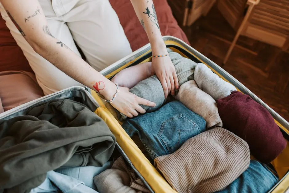 Packing list for international travel laid out before packing